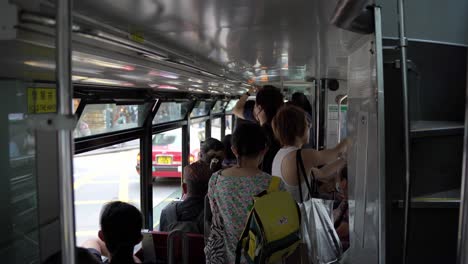 Inside-view-of-a-busy-tram-in-Hong-Kong