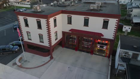 Fire-engine-parked-in-firehouse-garage