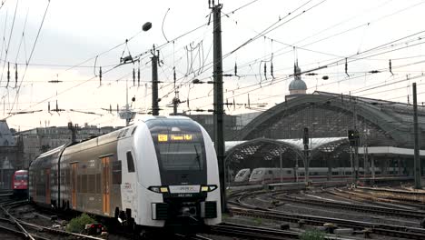 Rhine-Express-Train-Departing-Cologne-Central-Station-Viewed-From-Heinrich-Boll-Platz