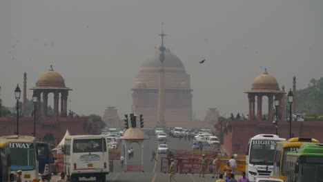 Delhi-Police-barricade-the-road-of-Rajpath-Central-Vista-lawns-renamed-as-Kartavya-Path,-New-Delhi-poor-air-quality,-low-visibility,-grey-smog-sky,-India