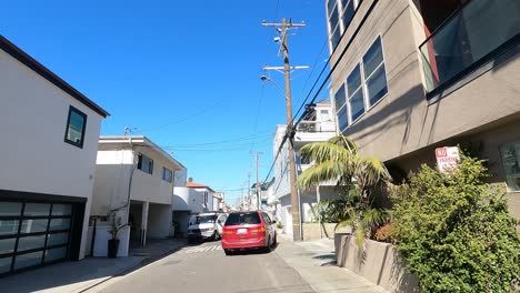 car-drives-down-narrow-alleyway