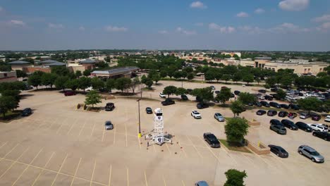 This-is-an-aerial-video-of-a-Police-Sky-Watch-tower-in-a-parking-lot-in-Highland-Village-Texas