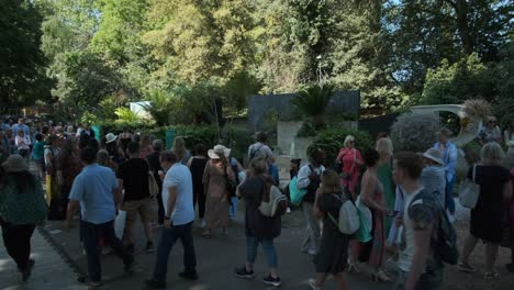 People-walking-past-and-interacting-with-exhibits-at-the-chelsea-flower-show