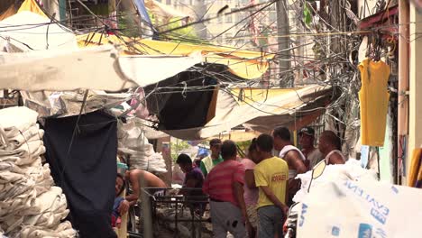 People-mingling-in-an-alleyway-in-a-poor-neighborhood-in-Manilla