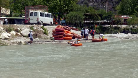Fun-adventure-tourists-river-rafting-down-rapid-flowing-river-Saklikent-gorge