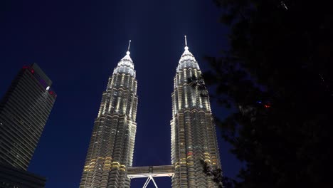 Beautifully-illuminated-Petronas-Twin-Towers-against-dark-blue-sky