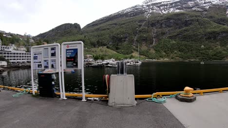 First-person-view-from-tourist-walking-on-the-dock-in-cruise-and-world-heritage-unesco-destination-Geiranger-fjord-Norway---Handheld