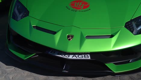 Parallax-shot-of-a-green-Lamborghini-parked