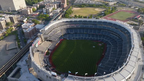 Aerial-view-tilting-over-the-Yankee-stadium-in-sunny-the-Bronx,-New-York,-USA