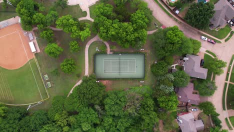 Aerial-footage-of-people-playing-tennis-in-Flower-Mound-Texas