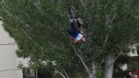 BMX-rider-jumps-over-a-ramp-and-performs-a-flip-without-holding-the-handlebars