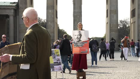 Women-Holding-Poster-Of-Julian-Assange-fighting-for-the-release-of-Australian-citizen-Julian-Assange-who-is-due-to-be-extradited-to-the-United-States,-Germany
