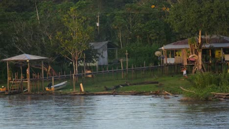 indigenous-of-amazonia-rainforest-living-in-wooden-house-on-the-river