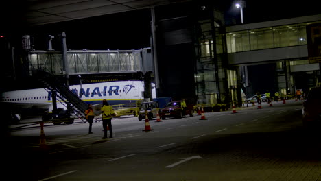 Airport-maintenance-in-anticipation-of-passengers-moving-on-the-runway-at-night