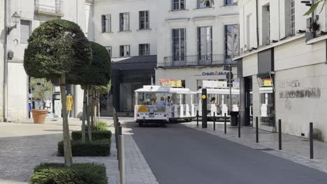 Tourist-train-in-Tours-France-is-rooming-streets-offering-informations-and-visual-presentation-about-the-city