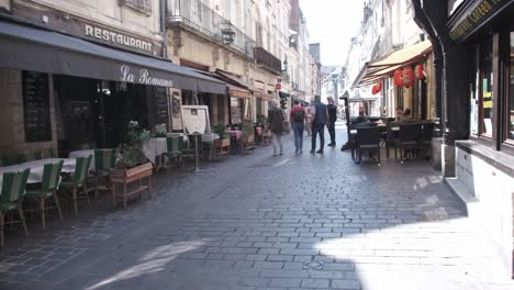 Centre-val-de-LoireTours-old-quarter-street-with-pedestrians-walking-on-a-sunny-day