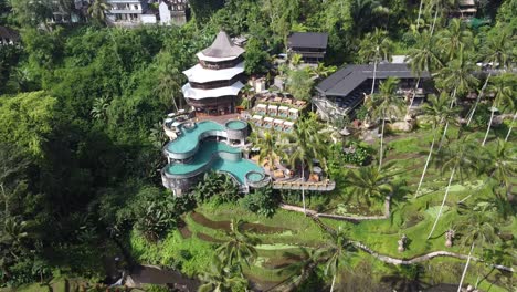 Cretya-Ubud-by-Alas-Harum,-a-Jungle-Day-Club-with-infinity-swimming-Pool-amid-rice-terraces-and-lush-tropical-palm-trees-forest