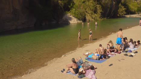 Tourists-On-The-Thermal-Swimming-Spots-At-Fuente-de-los-Baños-In-Montanejos,-Castellón,-Spain