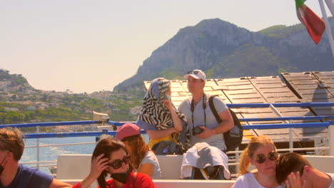 Tourist-boat-sailing-from-Capri-to-naples-in-sunny-day,-Italy,-HD-video