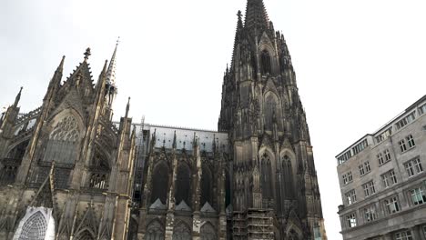 Wide-Shot-of-Cologne-Cathedral-in-Slow-Motion-as-a-Crowd-Forms