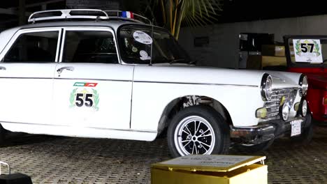 Old-timer-peugeot-406-Classic-white-showcased-in-dealership-garage-in-Paraguay