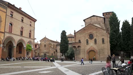 Square-in-Bologna-with-Basilica-of-Santo-Stefano-in-the-background,-establishing