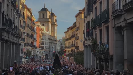 back-view-Processions-of-Holy-Week-María-Santísima-de-los-Siete-Dolores-crowded-Toledo-street-in-Madrid