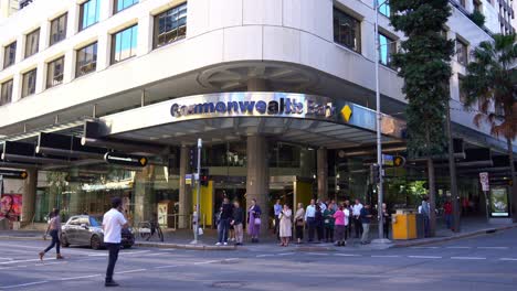 Static-shot-capturing-street-traffic-view-and-the-building-exterior-of-Australian-Big-4-financial-institution,-Commonwealth-bank-Queen-street-branch-corner-of-Edward-and-Queen-street-at-Brisbane-city