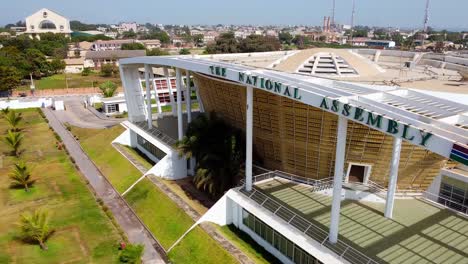Slight-rotating-view-of-The-Modern-Gambia-National-Assembly-building-with-Arch-22-in-background-in-Banjul