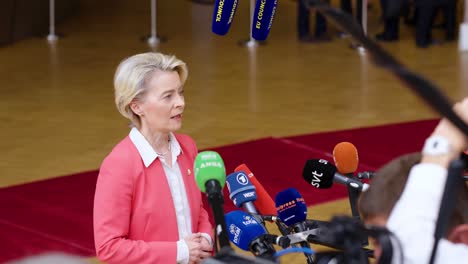 President-of-the-European-Commission-Ursula-von-der-Leyen-giving-an-interview-during-the-European-Council-summit-in-Brussels,-Belgium---Close-shot