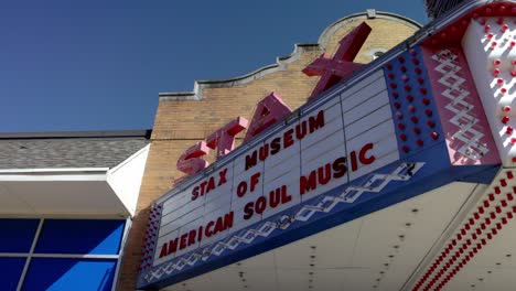 Stax-Museum-of-American-Soul-Music-sign-in-Memphis,-Tennessee-with-gimbal-video-panning-in-slow-motion