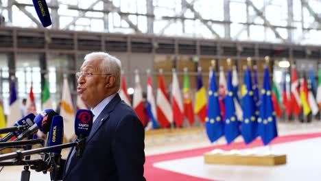 Prime-Minister-of-Portugal-António-Costa-giving-an-interview-during-the-European-Council-summit-in-Brussels,-Belgium---Cinematic-shot