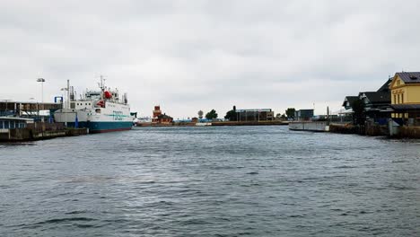 4K-60FPS-View-of-Helsingborg-Harbor-in-Sweden-With-Ferries-and-People-Walking-By---Panoramic-Shot