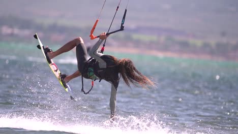 Los-Alcazares,-Spain,-May-3,-2023:-Sportsman-practicing-kite-surf-sport-at-the-beach-on-a-windy-day-at-the-Spanish-coasts