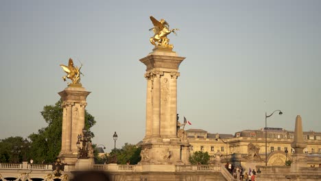 Pont-Alexandre-III-Bridge-with-victorious-Pegasus-Fames-sculptures-in-golden-bronze,-Advancing-boat-view-shot