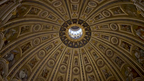 Looking-Up-At-Gilded-Stuccos-On-St-Peter's-Basilica-Dome-Ceiling-In-The-Vatican