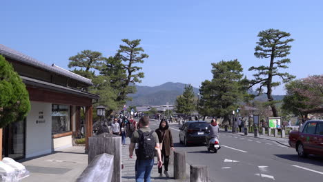 KYOTO,-JAPAN---April-4,-2023:-Tourist-walking-at-Arashiyama-district-tourist-shopping-area