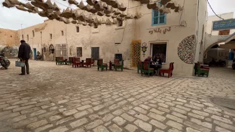 First-person-view-walking-in-Houmt-El-Souk-market-in-Djerba,-Tunisia
