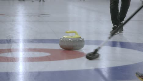 Curling-stone-coming-to-the-house