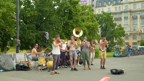 Street-performance-by-the-popular-music-group-Retropico-in-the-center-of-Warsaw-at-the-Wisława-Szymborska-Passage