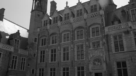 Pan-shot-of-museum-architecture-in-the-city-of-Bruges,-Belgium