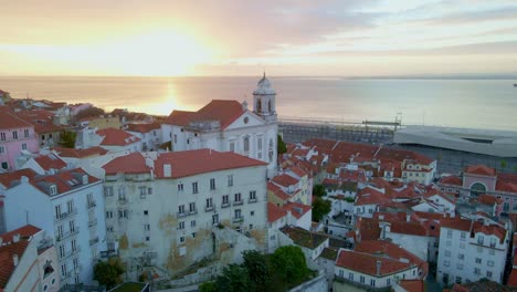 The-oldest-place-in-Lisbon,-Alfama-by-morning-light-taken-by-drone