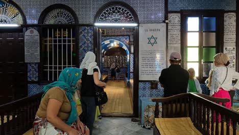Tourists-visiting-El-Ghriba-Jewish-synagogue-of-Djerba-in-Tunisia