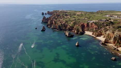 The-amazing-coast-of-Lagos,-in-the-province-of-Algarve,-Portugal,-by-drone