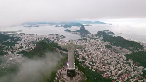 Christ-the-Redeemer-and-Rio-de-Janeiro-with-Guanabara-bay-establishing,-Brazil-aerial-view