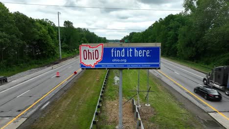 Aerial-dolly-forward-towards-Ohio-welcome-sign