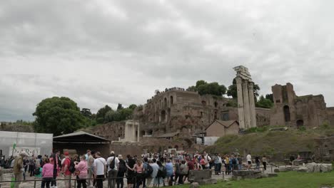 Crowds-At-The-Roman-Forum-With-View-Of-Palatine-Hill-and-Il-Tempio-dei-Dioscuri-In-Background