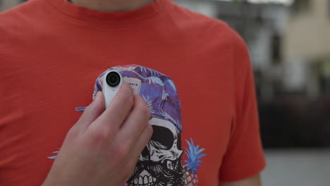 Influencer-Attaching-Insta360-Go-3-To-His-Shirt-With-Magnet