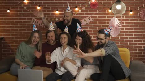 Group-of-people-at-home-celebrating-having-video-call,-singing-happy-birthday