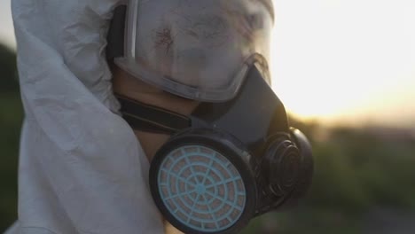 Portrait-shot-worker-in-protective-mask-and-respirator-outdoors